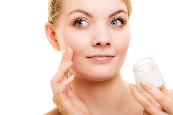 Woman applying moisturizing cream - Fotografie, Obrázek