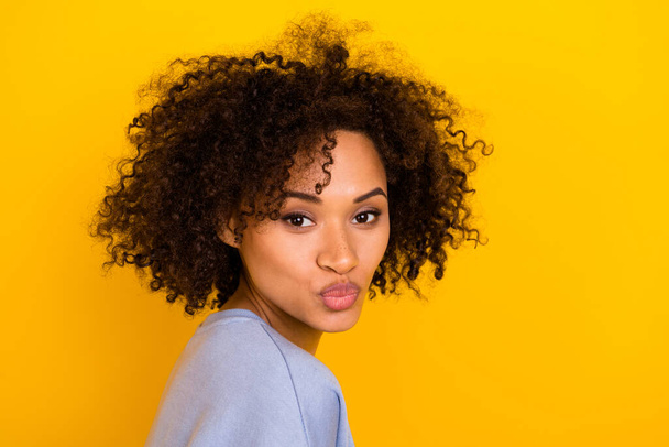 Profile photo of pretty adorable curly hairstyle lady kiss lips isolated on yellow color background. - Фото, зображення