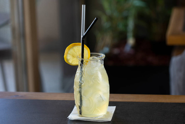 Cold lemonade served with straws - Fotó, kép