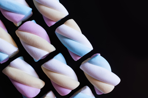 Flat lay with soft marshmallows isolated on black  - 写真・画像