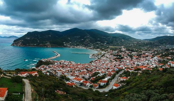 Dramatic winter scenery over the famous Skopelos town also known as chora in Skopelos island, Sporades, Greece - Photo, Image