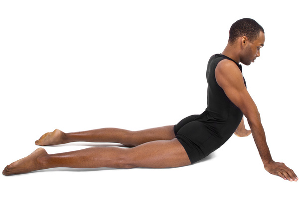 Male ballet dancer showing flexibility - Foto, afbeelding