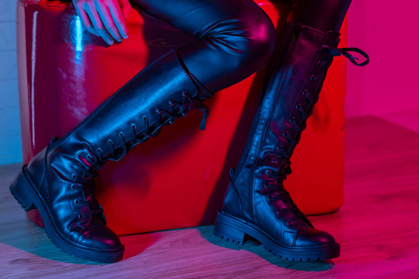 Young woman wearing fashionable boots - Zdjęcie, obraz