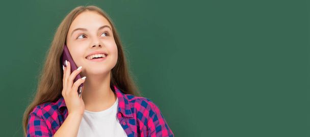 happy teen girl wear retro clothes. childhood happiness. negotiation. . Banner of school girl student. Schoolgirl pupil portrait with copy space - Фото, изображение