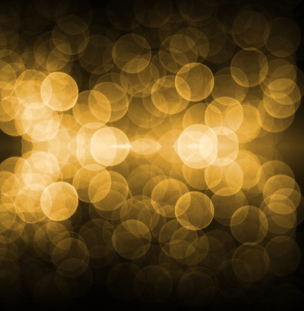 ゴールドのお祭りの背景。ボケ味を持つエレガントな抽象的な背景デフォーカス ライトと星. - 写真・画像