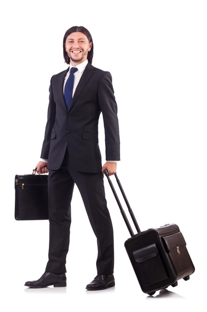 Businessman on business trip with luggage - 写真・画像
