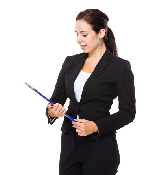 Businesswoman with clipboard - Fotó, kép