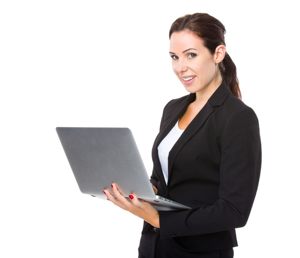 Caucasian businesswoman with laptop - Zdjęcie, obraz