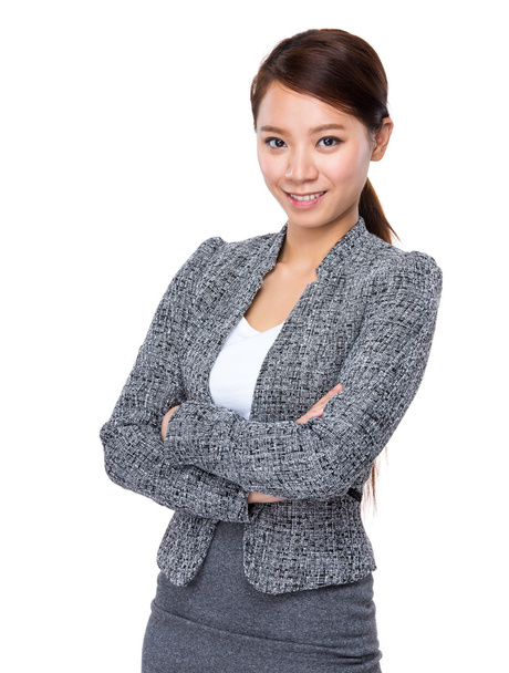 Businesswoman with arms crossed - 写真・画像