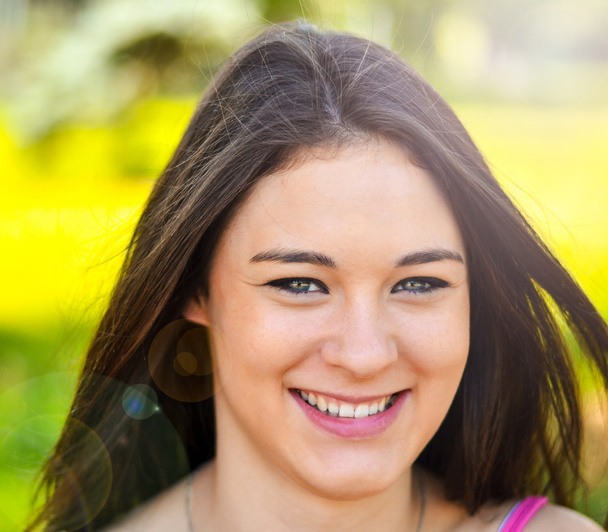 Young beautiful girl portrait smiling - Foto, Imagem