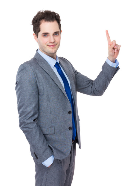 Uomo d'affari con dito puntato verso l'alto
 - Foto, immagini