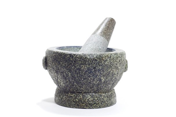 Stone mortar and pestle on white background - Photo, Image