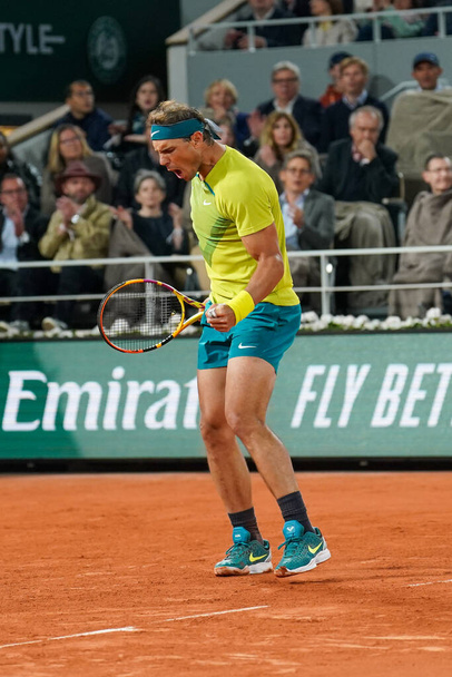 PARIS, FRANCE - MAY 31, 2022: Grand Slam champion Rafael Nadal of Spain in action during his quater-final match against Novak Djokovic of Serbia at 2022 Roland Garros in Paris, France - Fotoğraf, Görsel