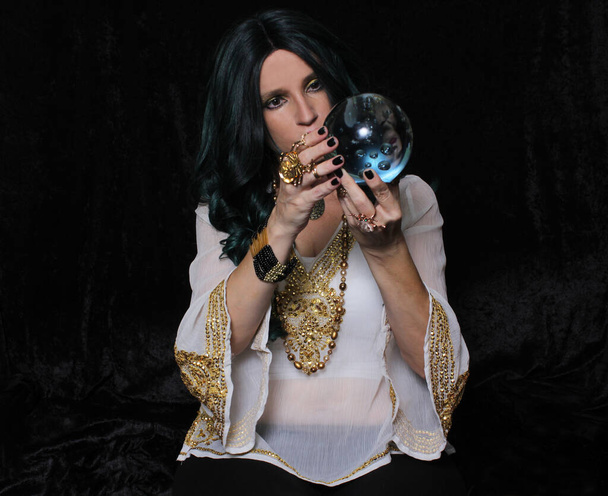 Psychic Fortune Teller With Crystal Ball on Black - Photo, Image