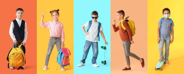 Set of cute schoolchildren on colorful background - Valokuva, kuva