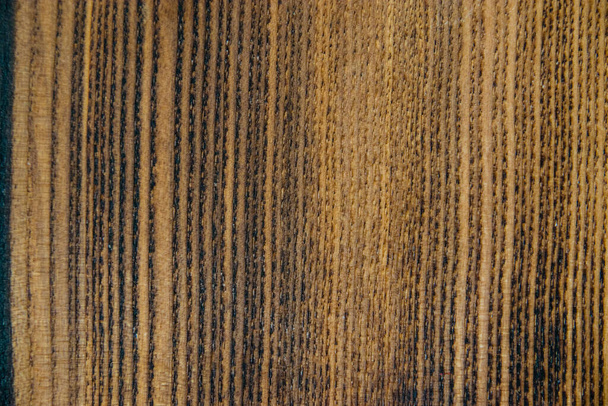 Wooden texture of an old dark burnt board for design work and home decoration. - Foto, imagen