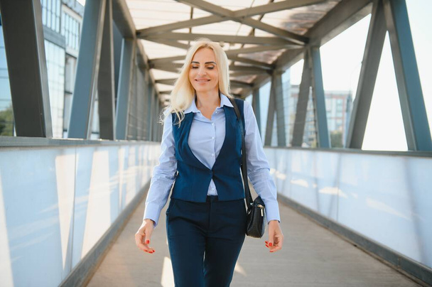 Business Women Style. Woman Going To Work. Portrait Of Beautiful Female In Stylish Office - Фото, изображение