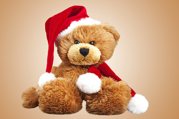 Teddy bear in a cap of Santa Claus - Fotoğraf, Görsel