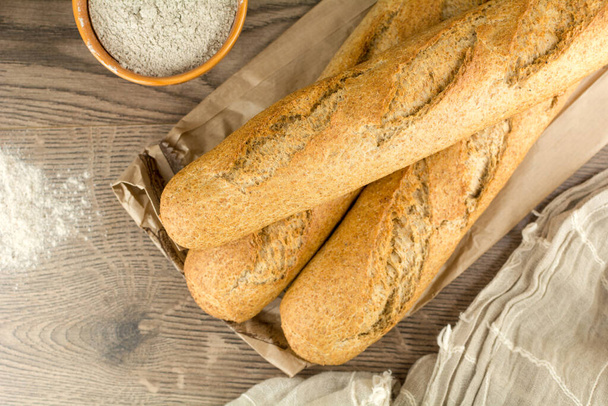 close-up shot of delicious freshly baked baguette - Photo, Image