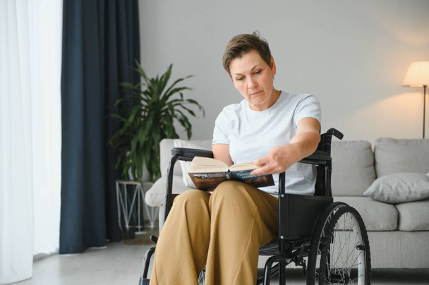 Senior woman on a wheelchair. - Foto, Imagem