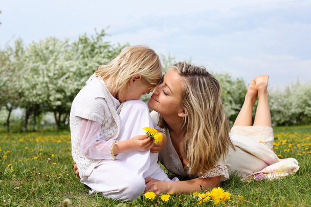 Girl with mother in the park - Photo, Image