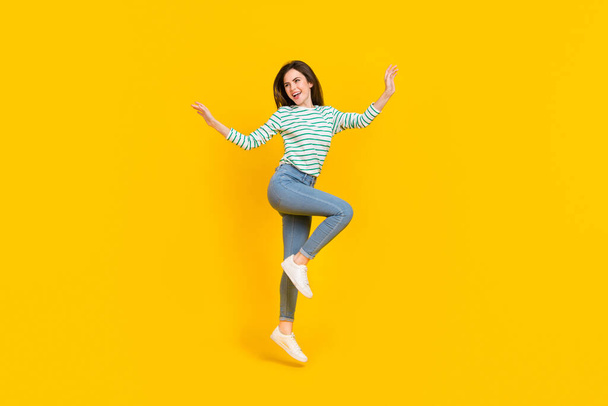 Full size photo of good mood cute female have fun dancing relaxing on weekend isolated on yellow color background. - Fotografie, Obrázek