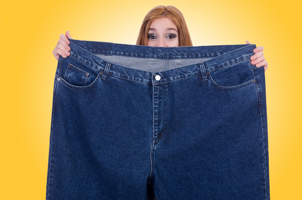Концепція дієти з оверсайз джинсами
 - Фото, зображення