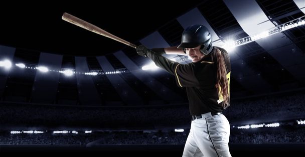 Powerful hit. Poster with baseball player with baseball bat in action during match in crowed sport stadium at evening time. Sport, win, winner, competition concepts. Collage, flyer for ad, text - Valokuva, kuva