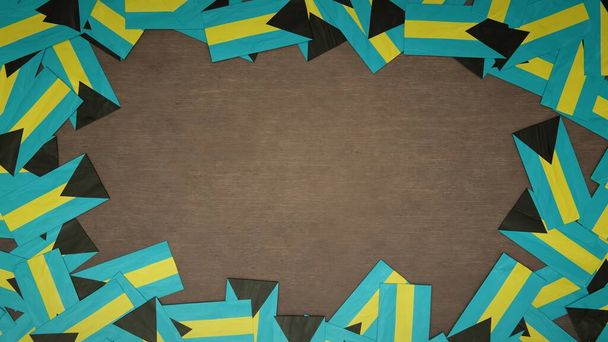 Telaio fatto di bandiere di carta delle Bahamas disposti su tavolo di legno. Concetto di celebrazione nazionale. Illustrazione 3D - Foto, immagini