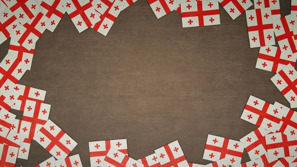 Cadre fait de drapeaux en papier de Géorgie disposés sur une table en bois. Concept de célébration nationale. Illustration 3D - Photo, image