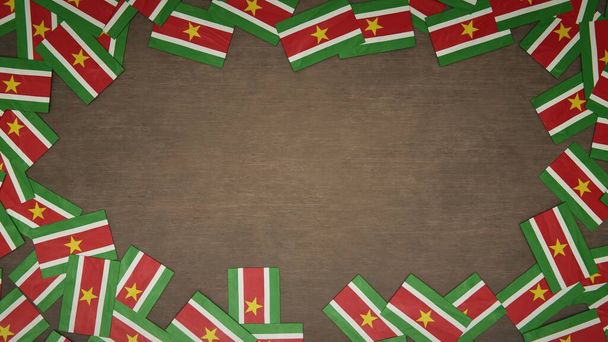 Cadre en papier drapeaux du Suriname disposés sur une table en bois. Concept de célébration nationale. Illustration 3D - Photo, image