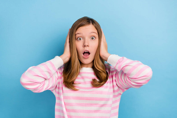 Portrait of shocked confused person hands head cover eyes open mouth isolated on blue color background. - Foto, Imagen