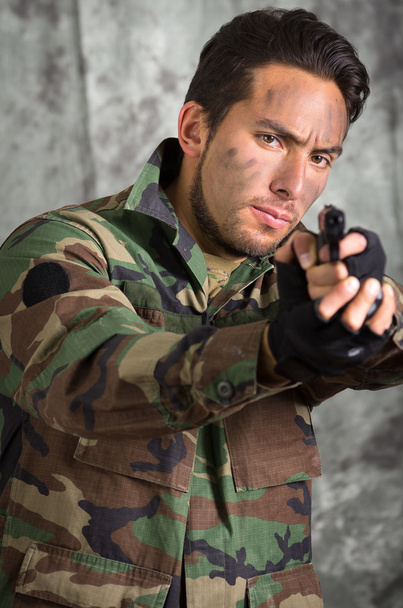 soldier militar latin man pointing a gun - 写真・画像