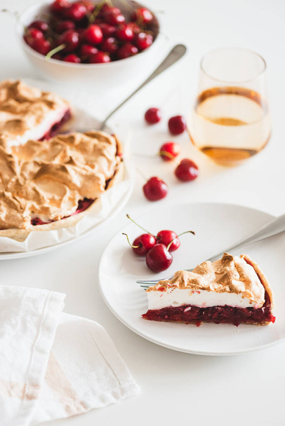 Plate with tasty cherry pie on white background. Front view - 写真・画像