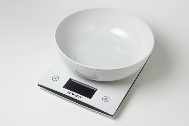 Electronic kitchen scales on a white background. Kitchen appliances. - Photo, Image
