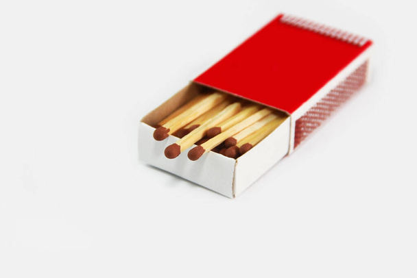 wooden yellow matches with sulfur for ignition in a paper box - Photo, Image