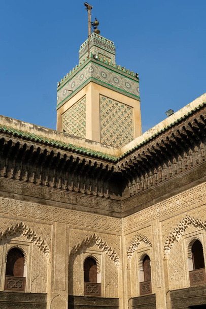The minaret of Madrasa Bou Inania in the old medina of Fes - Fotó, kép