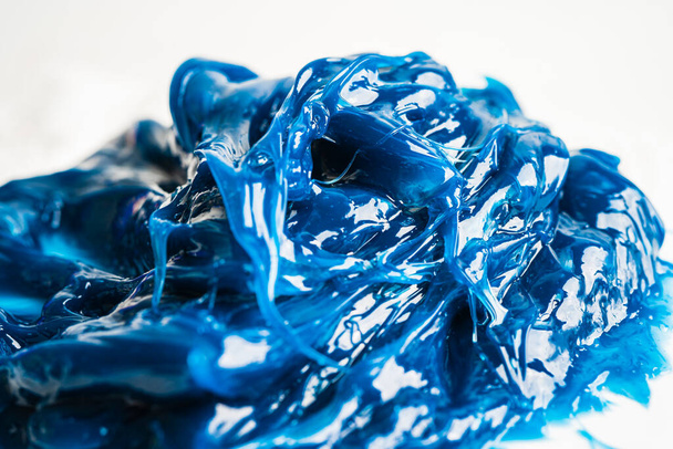 Modrá prémiová kvalita syntetického plastického plastického maziva, vysoké teploty a mazání strojů pro automobilový a průmyslový průmysl. - Fotografie, Obrázek