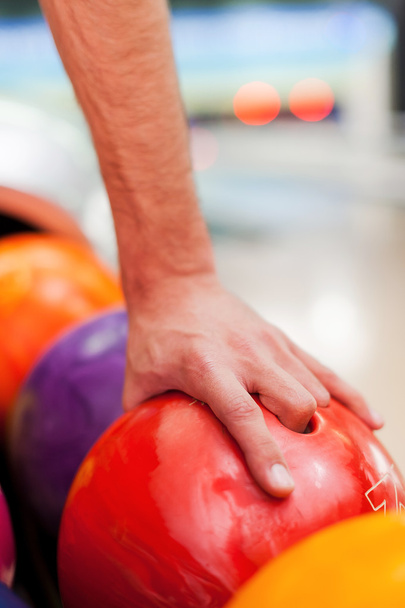 Hand holding bowling ball - Фото, зображення