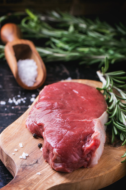 Raw steak with herbs and pepper - Zdjęcie, obraz
