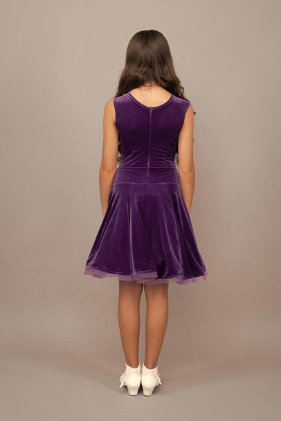 back view of teen girl in dance ballroom dress full length, fashion. - Photo, Image
