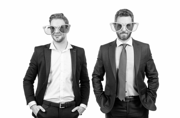 Work all day, party all night. Professional men wear funny glasses. Dressed up businessmen isolated on white. Corporate party. Free yourself by a little fun. - Foto, afbeelding