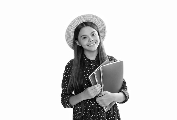 kid going to do homework. high school education. schoolgirl with copybook. happy teenager girl with notebook. back to school. child in straw hat ready to study. childhood development. - Fotografie, Obrázek