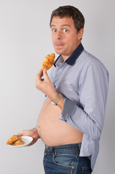 男はダイエットをしない、彼は食べています - 写真・画像