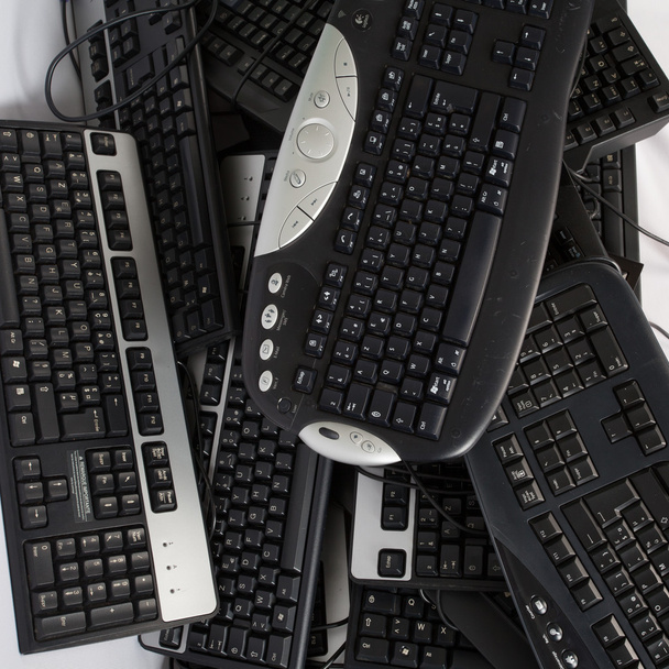 Computer keyboard on a pile - Photo, Image