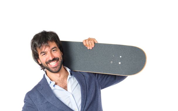 Бизнесмен со скейтом на изолированном белом фоне
 - Фото, изображение