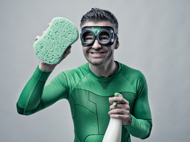 Superhero cleaning with sponge and detergent - Fotó, kép