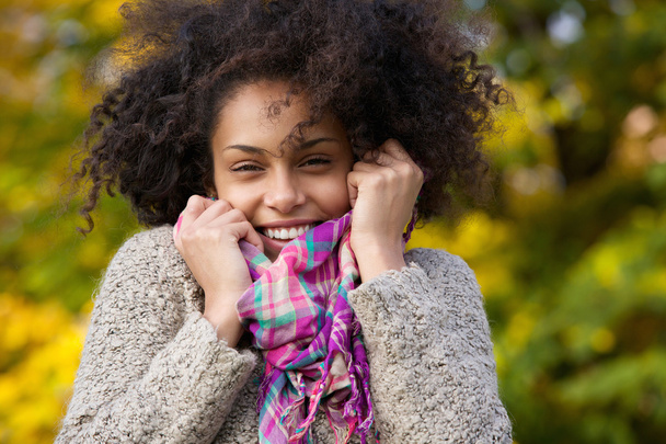 Young woman laughing outdoors in autumn - Фото, зображення