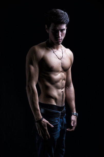 Handsome shirtless muscular young man's profile - Foto, afbeelding