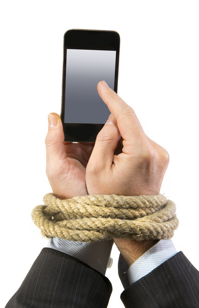 Mãos de homem de negócios viciado em pulsos de ligação de corda de telefone móvel no vício em internet smartphone
 - Foto, Imagem
